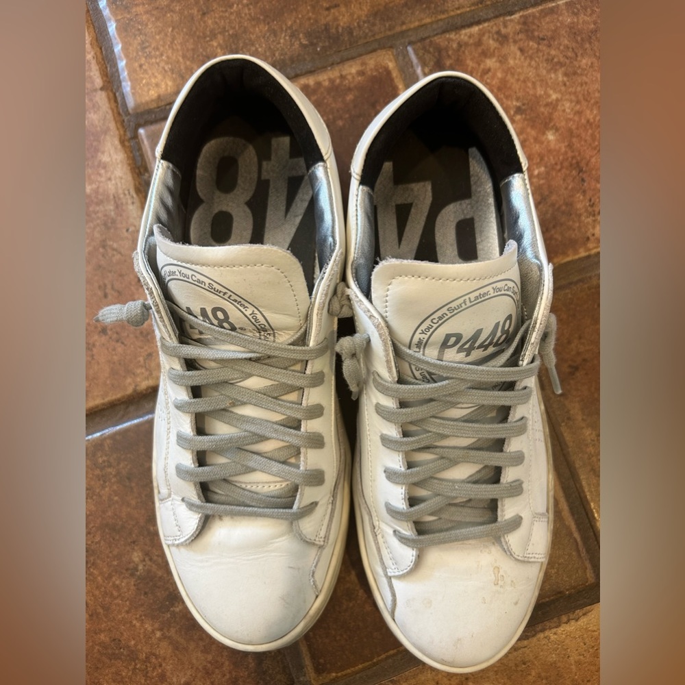 P448 white tennis shoes.